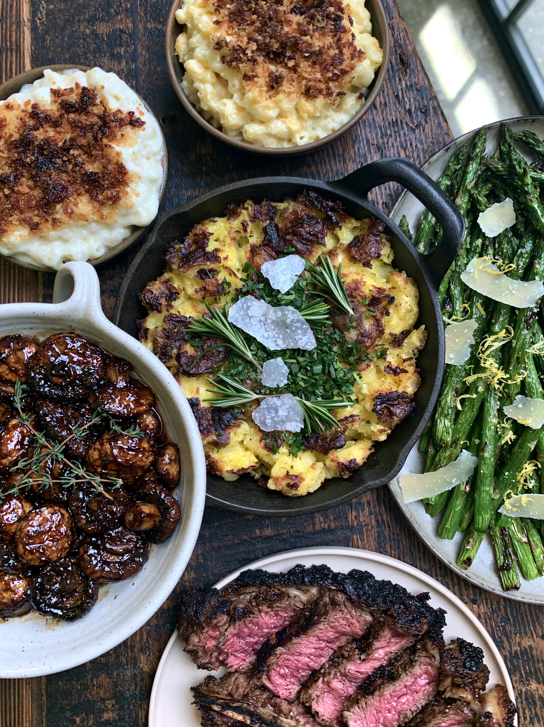 Side Dishes for Steak: The Ultimate Gourmet Steakhouse Spread 4 Top-down view of golden-brown smashed potatoes and glossy balsamic mushrooms as side dishes for steak.